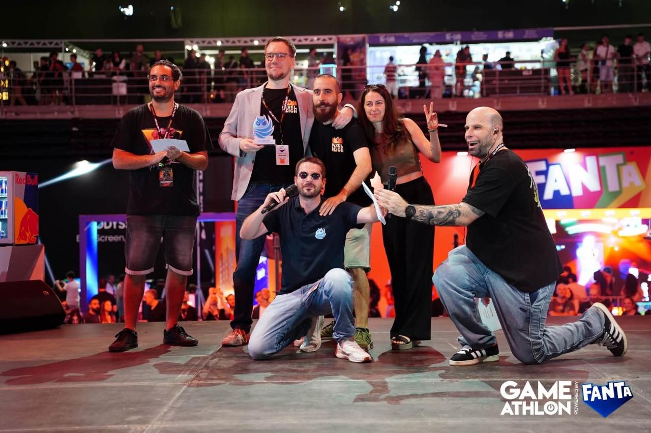 Pixel Reign team with the Hellenic Game Awards 2026 trophy